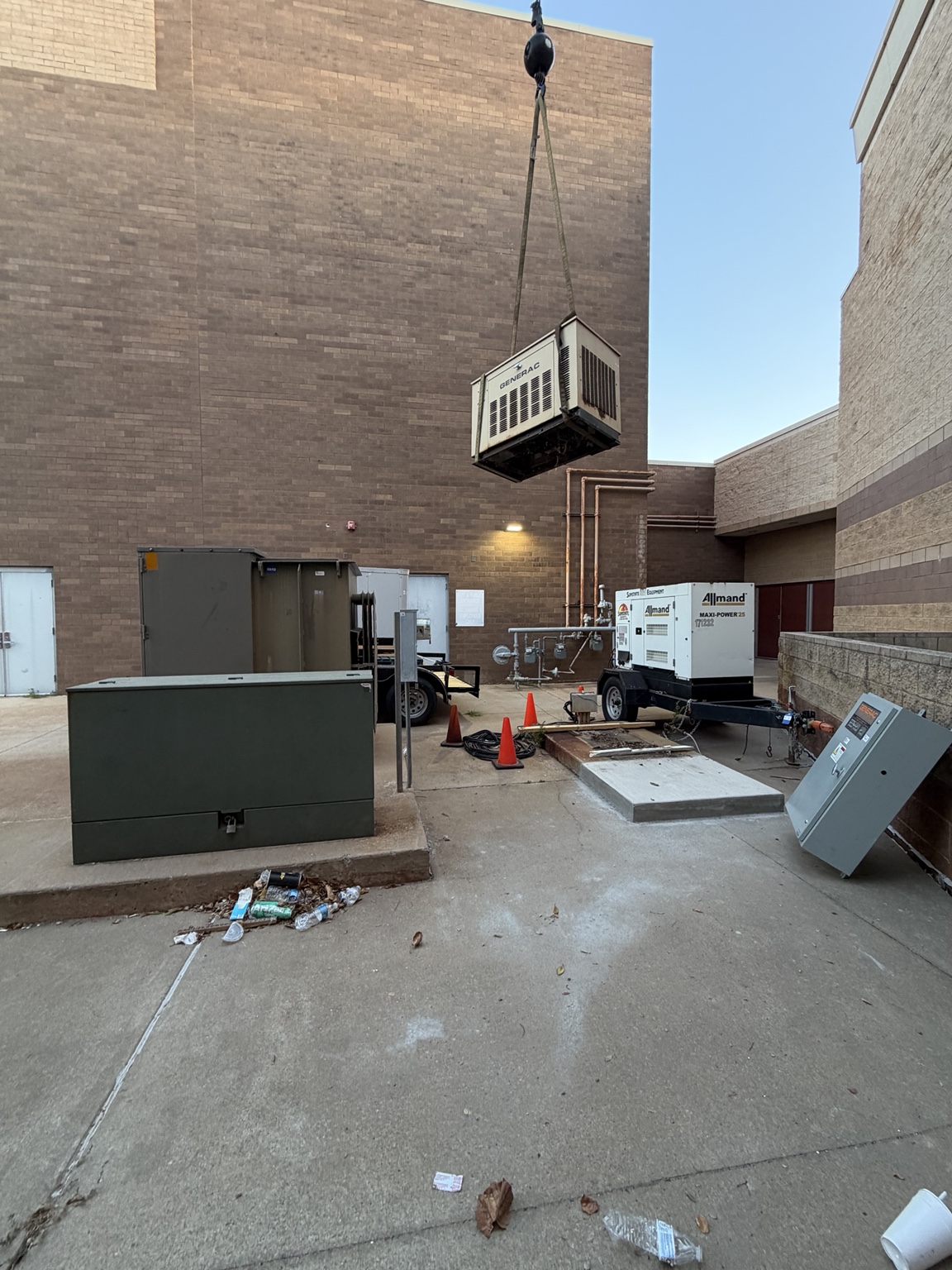 Commercial generator lifted into place by crane